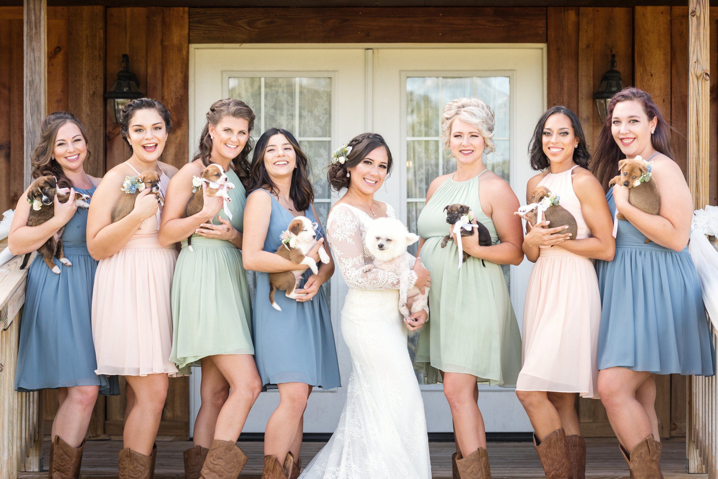 bridal_party_advocates_shelter_animal_adoption_by_exchanging_bouquets_for_sweet_puppies